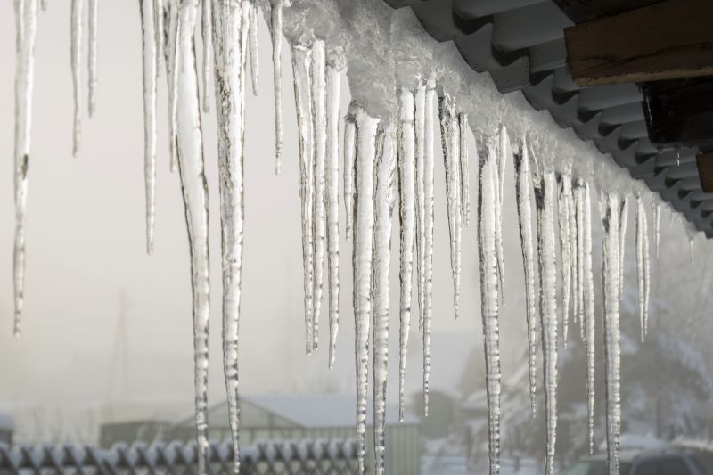 Scheduling repairs before winter helps prevent ice buildup and water damage during freezing temperatures.